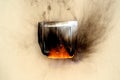 Close-up image of burning electric switch.