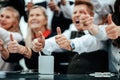 close up. image of business people showing thumbs up