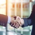 Close-up image of businessman handshake. Business partnership meeting concept.