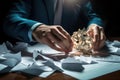 Close-up image of businessman sitting at table and crumpling paper, business brain storm strategy ideas sharing hand paper Royalty Free Stock Photo