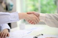 Close-up image of businesspeople shaking hand during the the meeting. Partnership, cooperation Royalty Free Stock Photo