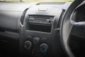 Close up image of car dashboard audio radio air conditioner console. Car audio player. Royalty Free Stock Photo