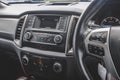 Close up image of car dashboard audio radio air conditioner console. Car audio player. Royalty Free Stock Photo