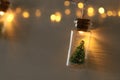 close up image of Christmas tree in the masson jar garland light.