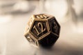 Close-up image copper role playing die d12 Royalty Free Stock Photo