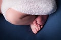 Close up image of cute baby feet. Newborn photography detail infant toes Royalty Free Stock Photo