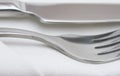 Close up image of cutlery on white napkin