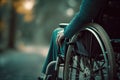 Close up image of disabled person in wheelchair. Unrecognizable person. Disability inclusion and accessibility concept.