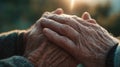 Close-Up of Hands Symbolizing Intergenerational Love in Soft Light Royalty Free Stock Photo