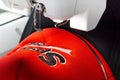 Close up picture of sport cap and embroidery machine