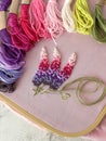 embroidery of flowers in French knot technic, canvas