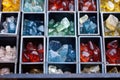 close-up image of ethically sourced raw gemstones in bins