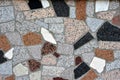 Close up image of exterior facade stone colorful tiles