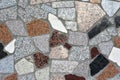 Close up image of exterior facade stone colorful tiles