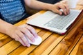 Close-up image of female hand writing on laptop Royalty Free Stock Photo