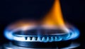 Gas burner flame igniting, symbolizing energy, combustion, and heating Royalty Free Stock Photo