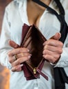 Close-up image of girl& x27;s hands with an open empty purse in her hands. Royalty Free Stock Photo