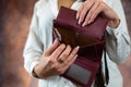 Close-up image of girl& x27;s hands with an open empty purse in her hands. Royalty Free Stock Photo