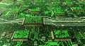 Detailed View of a Green Circuit Board with Microchips Royalty Free Stock Photo