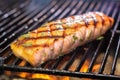 close-up image of a grilled mahi-mahi steak being checked for flakiness