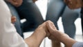 Close up image group of people holding hands praying Royalty Free Stock Photo