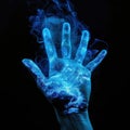A close-up image of a hand with blue smoke emerging from the fingers Royalty Free Stock Photo