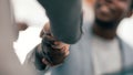 Close up. image of a handshake of young business people