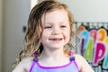 A close up image of a happy smiling little girl on her birthday Royalty Free Stock Photo