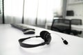 Close up image of headphones for competent online working. Royalty Free Stock Photo