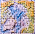 Close up of a jigsaw puzzle map depicting Arctic