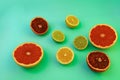 Close up image of juicy organic whole and halved assorted citrus fruits with visible core texture, isolated white background, copy Royalty Free Stock Photo