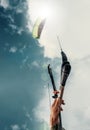 Close up image kitesurfer hand with kite in blue sky Royalty Free Stock Photo