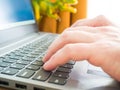 Close up image of male hands typing on laptop keyboard Royalty Free Stock Photo