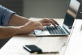 Close up image male hands typing on laptop keyboard Royalty Free Stock Photo