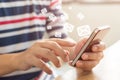 Close-up image of male hands using smartphone with icon envelope email Royalty Free Stock Photo