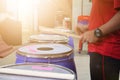 Close-up of the image of a man playing a drum, music practice concept