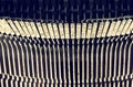 Close up image of metallic typewriter keys. vintage filtered. selective focus Royalty Free Stock Photo