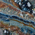 Close-up image of a mineralized rock surface featuring layers of shimmering metallic Royalty Free Stock Photo