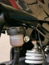 Close up image of motorcycle brake fluid tank reservoir. Royalty Free Stock Photo