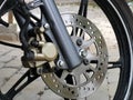 Close up image motorcycle front brake disc system. Royalty Free Stock Photo
