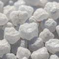 Close-up image of multiple white sugar crystals, each with an irregula Royalty Free Stock Photo