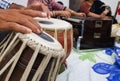 Close up image of musician hand playing tabla, an indian classical music instrument with focus on front hand Royalty Free Stock Photo