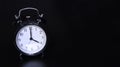 Close up image of old black vintage alarm clock. Four o`clock Royalty Free Stock Photo