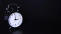 Close up image of old black vintage alarm clock. Three o`clock Royalty Free Stock Photo