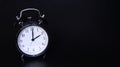 Close up image of old black vintage alarm clock. Two o`clock Royalty Free Stock Photo