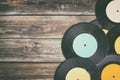 Close up image of old records over wooden table , image is retro filtered . Royalty Free Stock Photo