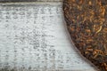 Close up image old Shu puerh chinese fermented tea on rustic wooden background