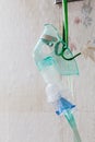 Close-up image of an oxygen mask hanging