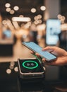 Contactless mobile payment with smartphone at modern store terminal Royalty Free Stock Photo