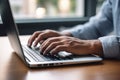 Close Up of Person Typing on Laptop